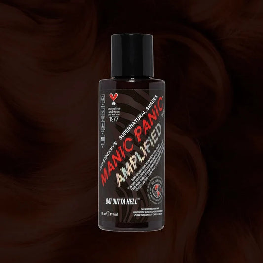 Manic Panic SuperNaturals Bat Outta Hell hair dye bottle on brownish-black wavy hair