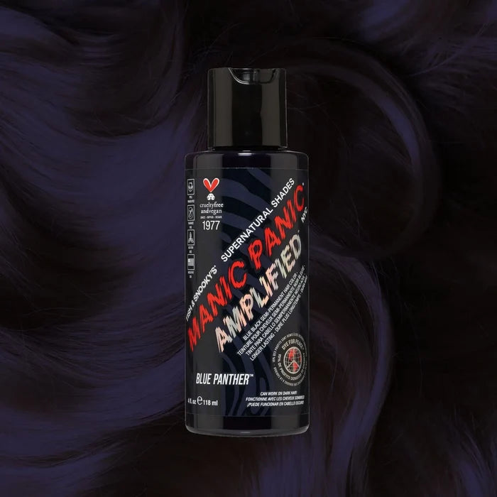 Manic Panic SuperNaturals Blue Panther navy hair dye bottle on blue-black wavy background