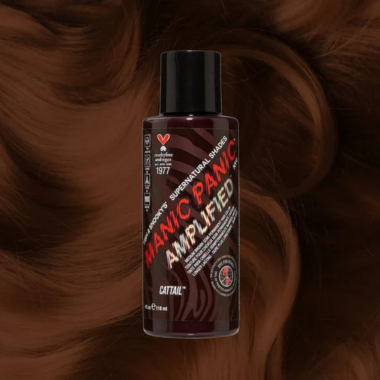 Manic Panic SuperNaturals Cattail brown hair dye bottle on warm brunette wavy background.