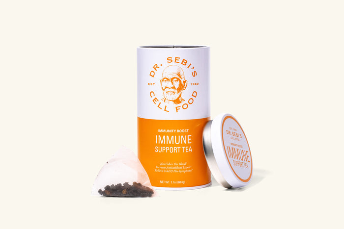 Dr. Sebi's Immune Support Tea in orange packaging with loose tea leaves and metal tin displayed against a light background.