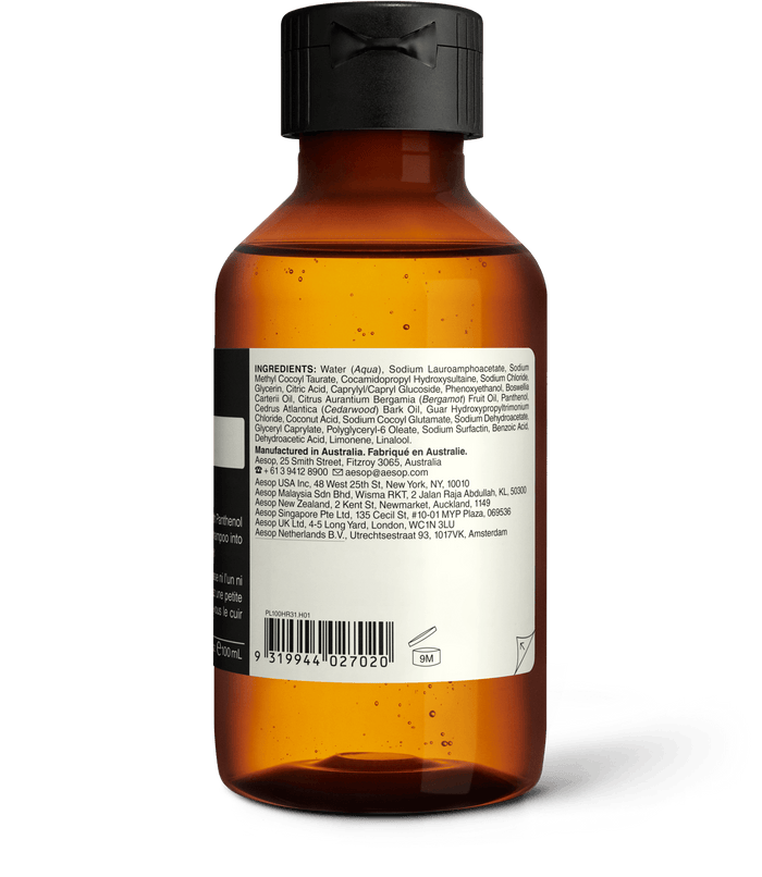 Back of the 100ml bottle of Aesop Shampoo displaying ingredients and manufacturing information