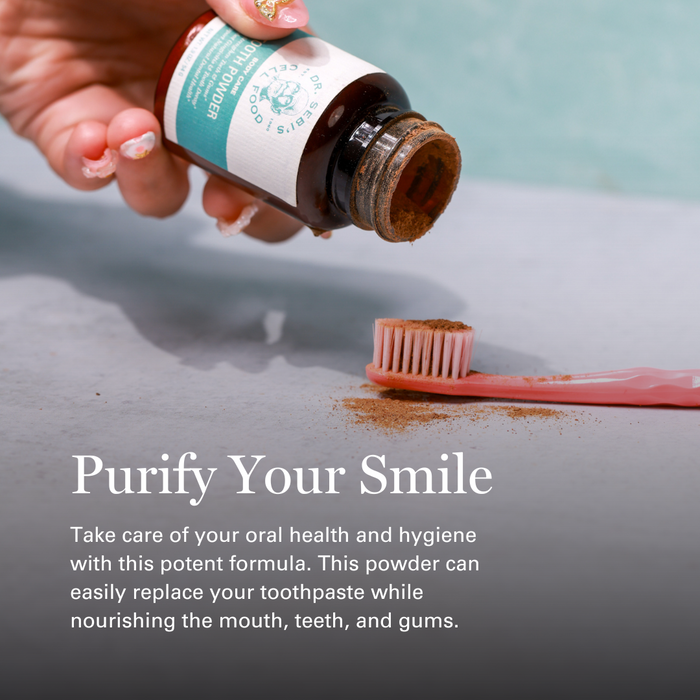 Hand pouring Dr. Sebi herbal tooth powder onto pink toothbrush with ocean background and "Purify Your Smile" text.